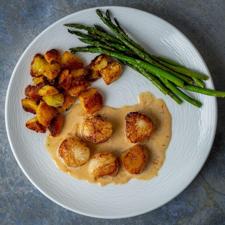 Seared Scallops with Champagne Cream Sauce